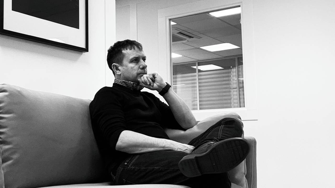 Stephen Mitchell, known as Mitch, founder and CEO of SQCDP, seated in conversation
